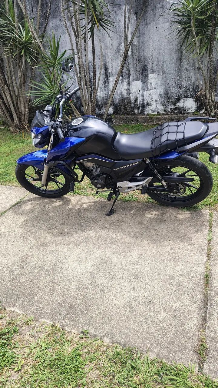 moto titam