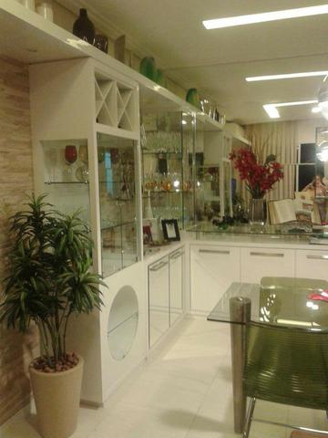Vendo apt padrão, 2 qtos, sendo uma suíte, cozinha americana, projetado