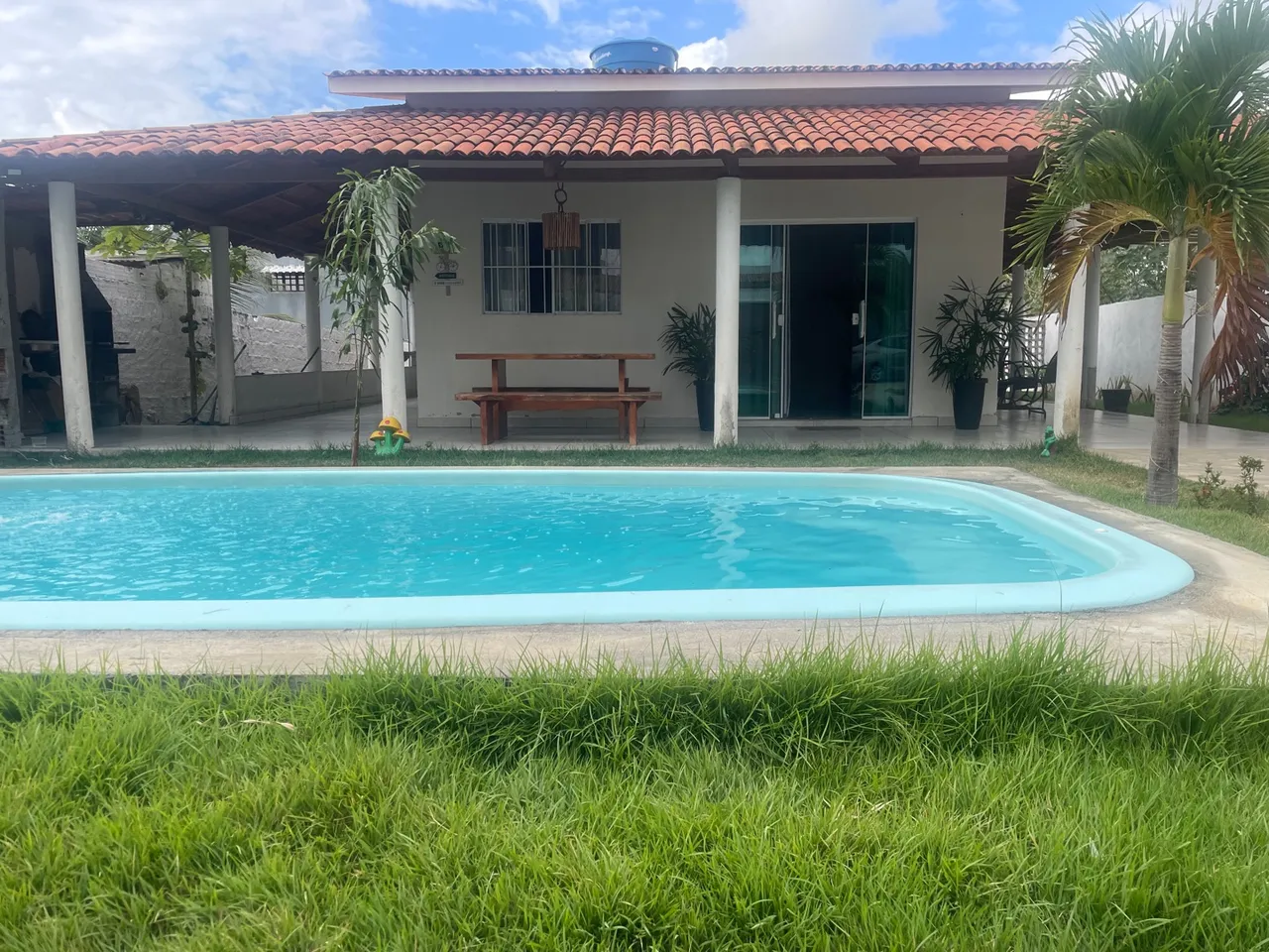 Linda casa com varandas e excelente localização