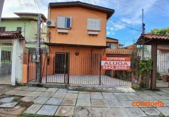 Casa com 3 dormitórios para alugar, 60 m² por R$ 1.440,00/mês - Vila Nova - Porto Alegre/R
