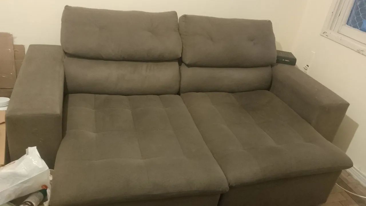 Vendo Sofá retrátil 1ano de uso
