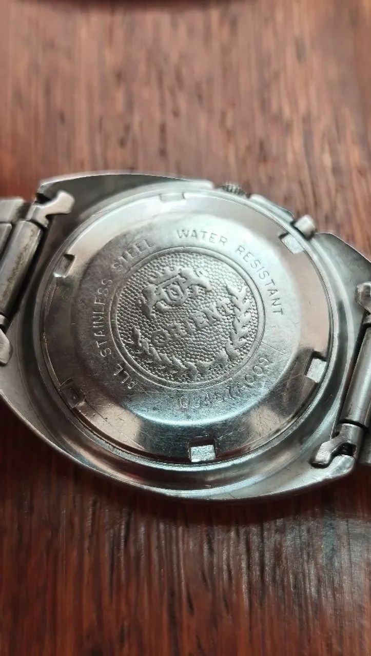 Relógio Orient Automático Vintage Prata com verde degradê e detalhe retangular no centro  - Foto 5