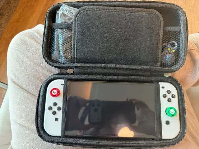 Nintendo Switch Oled + 7 jogos mídia física. - Foto 4