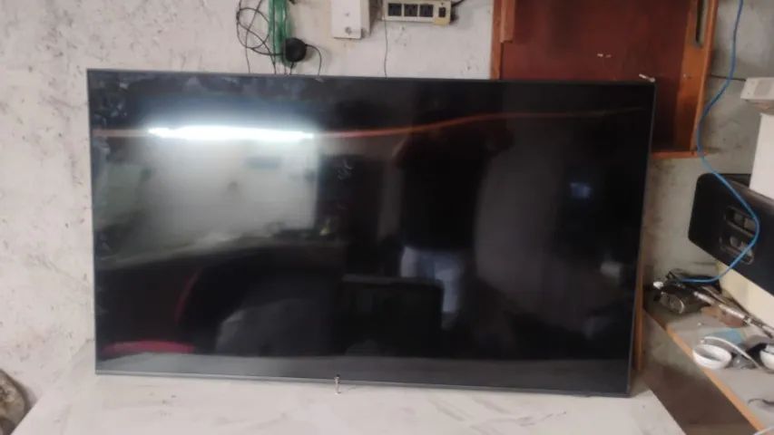 Tv Samsung Qled 55 pol  com a placa de sinal queimada