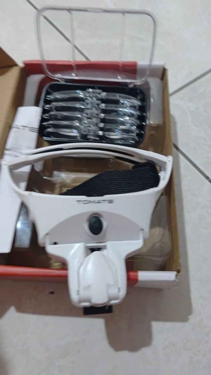 Óculos lupa led recarregável. 