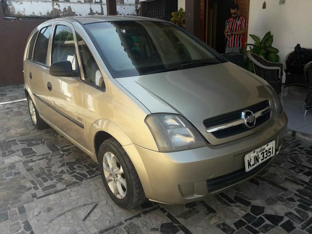 Meriva completa joy troco por moto aceito cartão