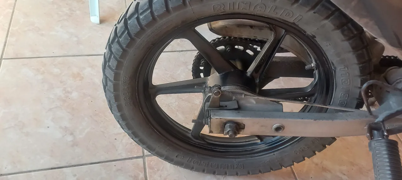 Troco aros liga leve da bros 150 em aros normais