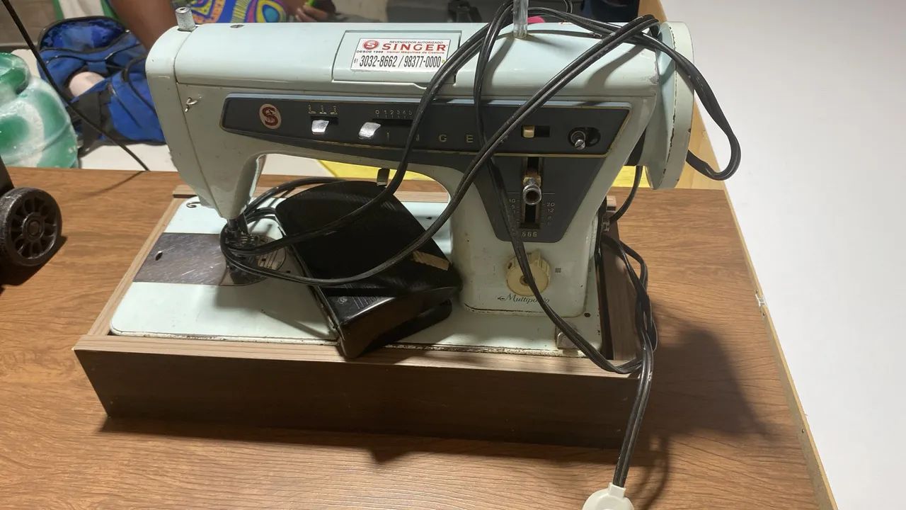 Máquina de costura singer 