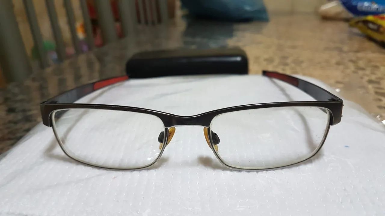 Armação oakley metal 