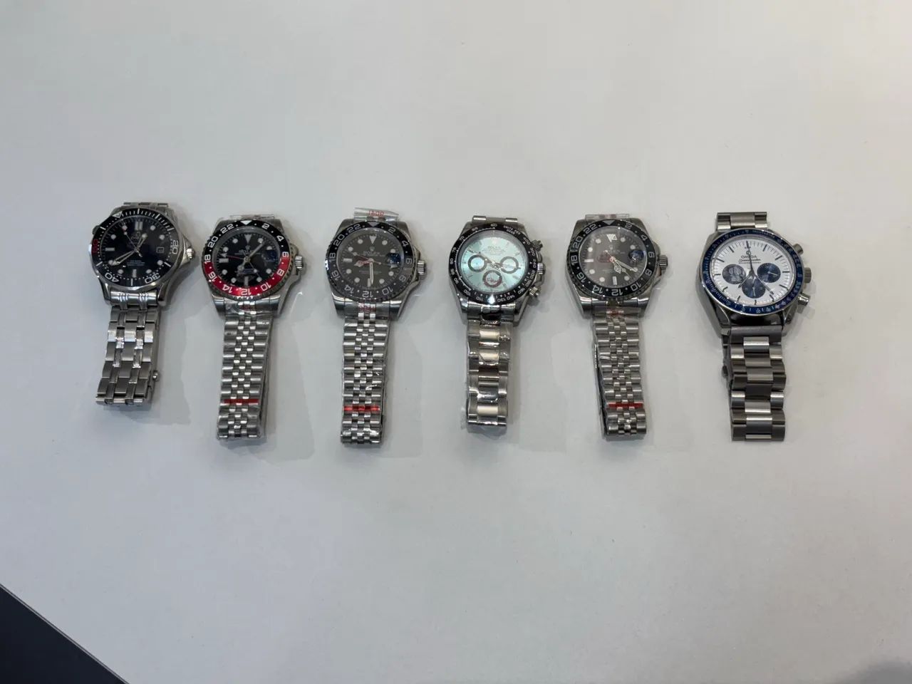 Relógios premium Rolex e Ômega