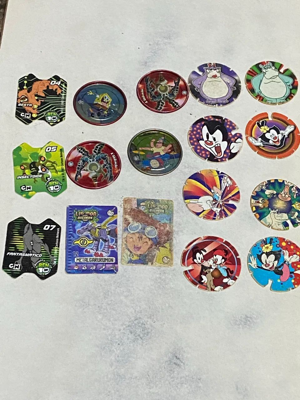 Tazos ben 10  animaniacs