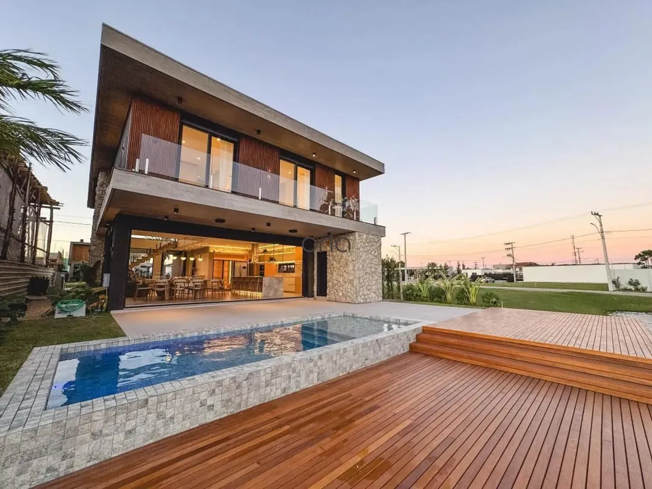 Casa beira lago mobiliada e decorada com 05 suítes à venda - Condomínio Amare em Xangri-lá