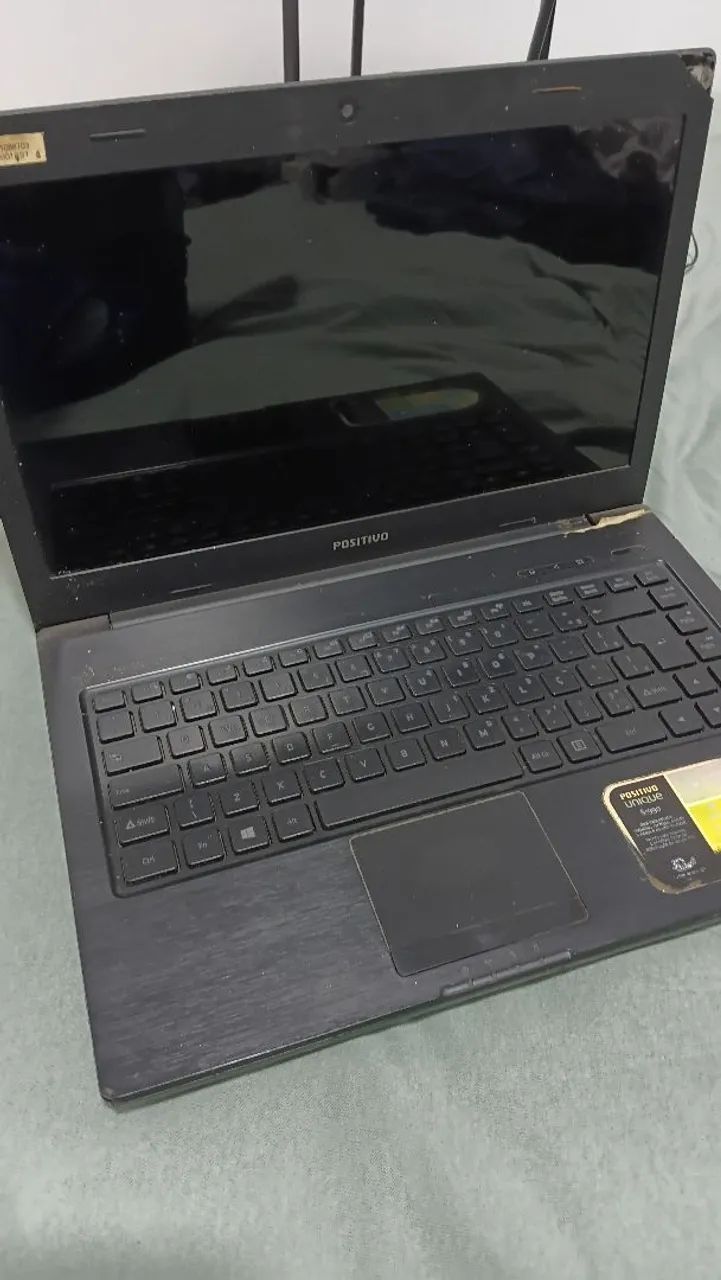  Notebook antigo usado para retirar peças 