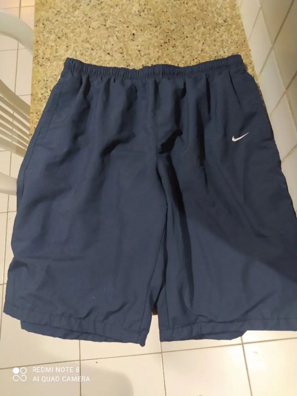 Bermuda corta vento Nike g