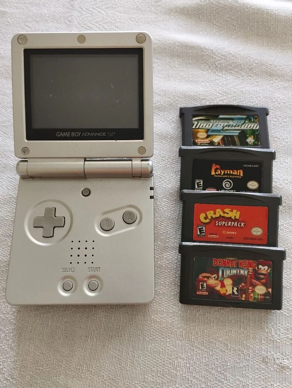 Game boy  Advanc e sp , leia o anúncio !