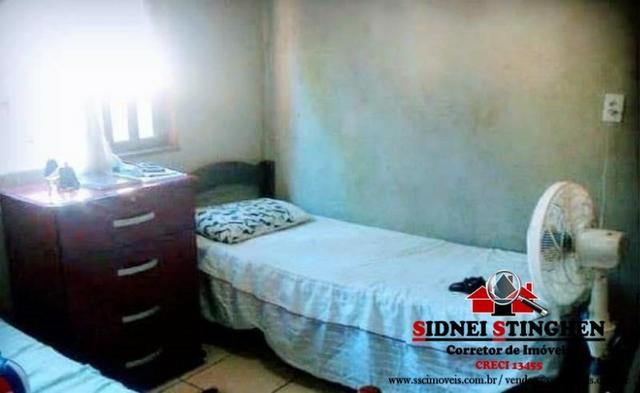 Casa na praia, local com rua pavimentada, imóvel próximo a água - Foto 4