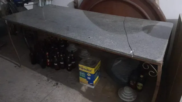 mesa grande de pedra granito e ferro