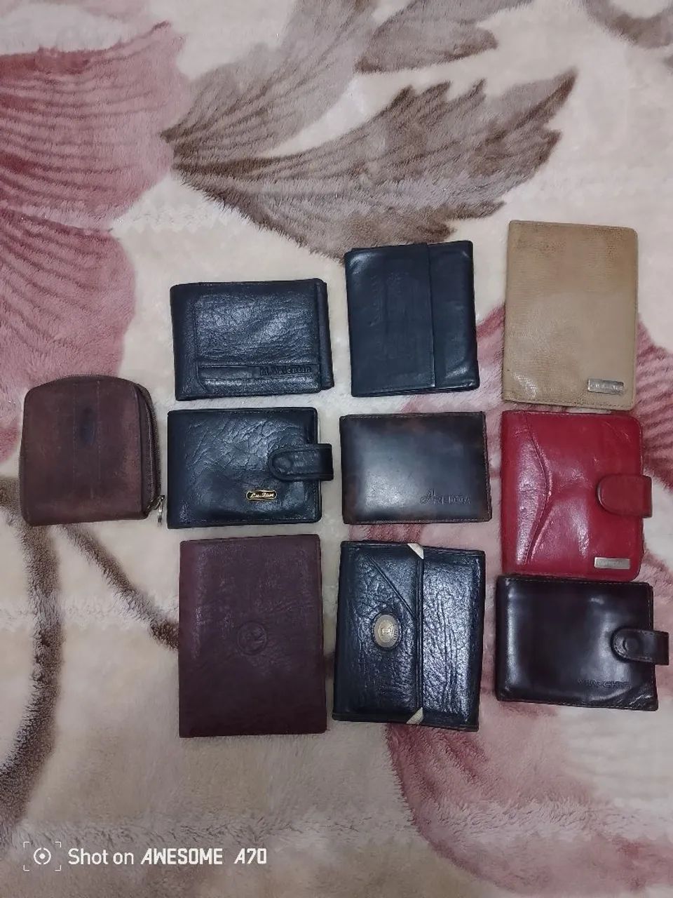 Lote de carteiras de couro, uma couro de cabra