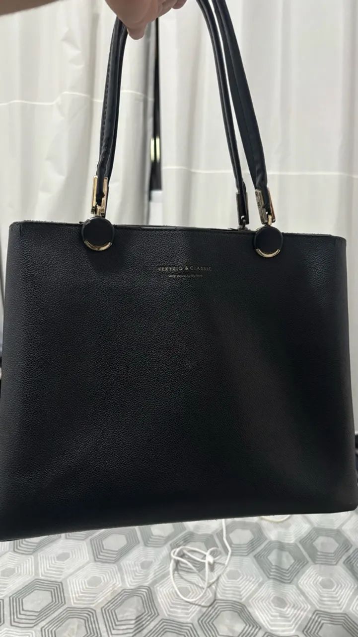 Bolsa de ombro e mão
