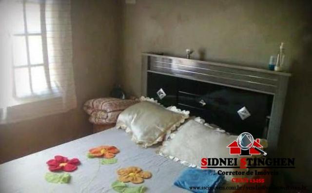 Casa na praia, local com rua pavimentada, imóvel próximo a água - Foto 6