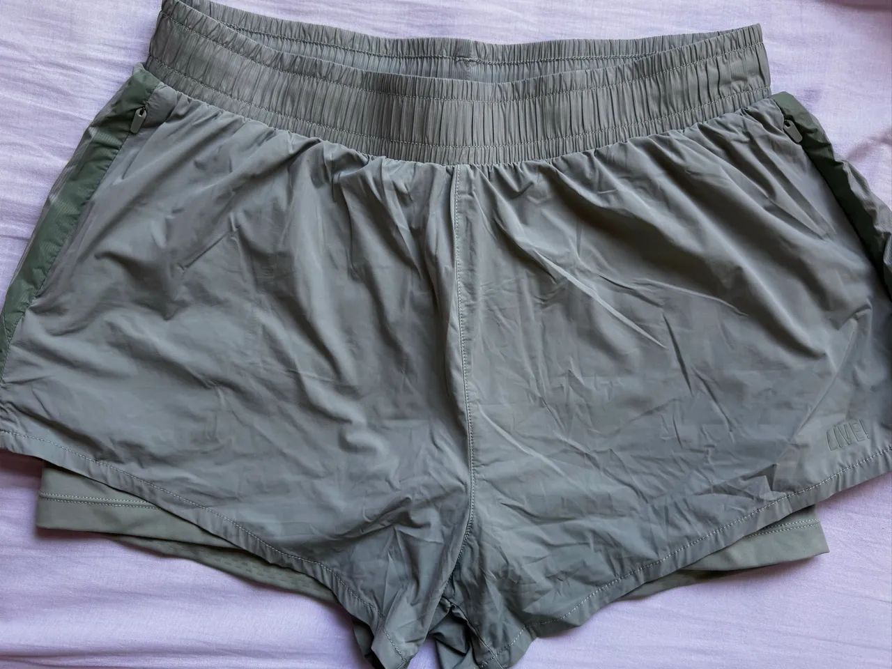 Short LIVE M - com bolso 