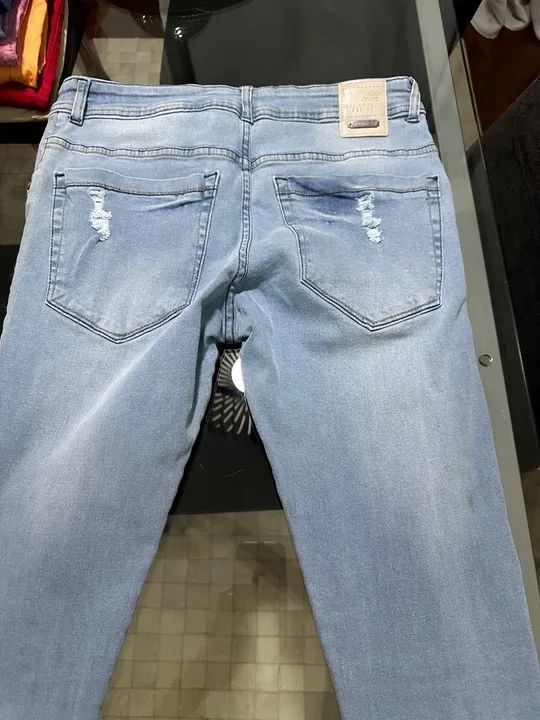 Calça Jeans Masculina fashion slim feet com ziper na perna Azul Claro tamanho 40 - Foto 4