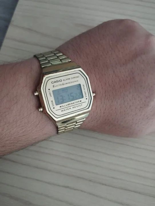 Relógio Casio R$:100 Reais Original Dourado