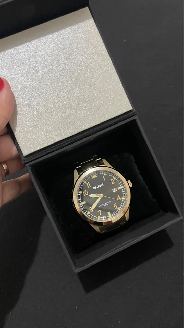 Relógio Orient Dourado - Elegância e Estilo