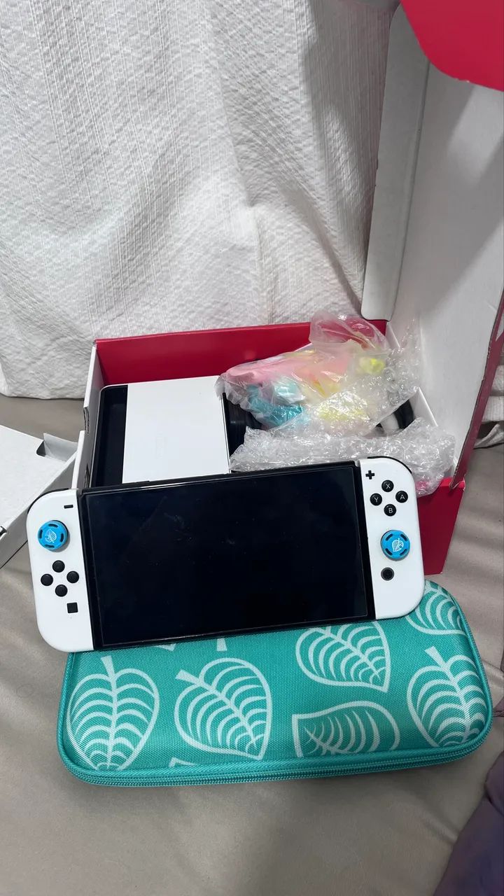 Nintendo Switch OLED impecável + caixa e acessórios - Foto 4