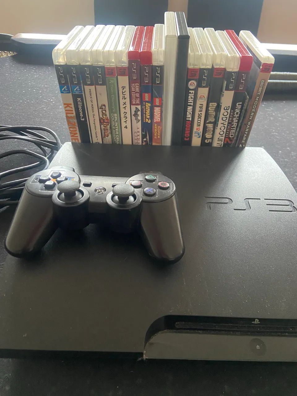 PS3 + 19 jogos  - Foto 2