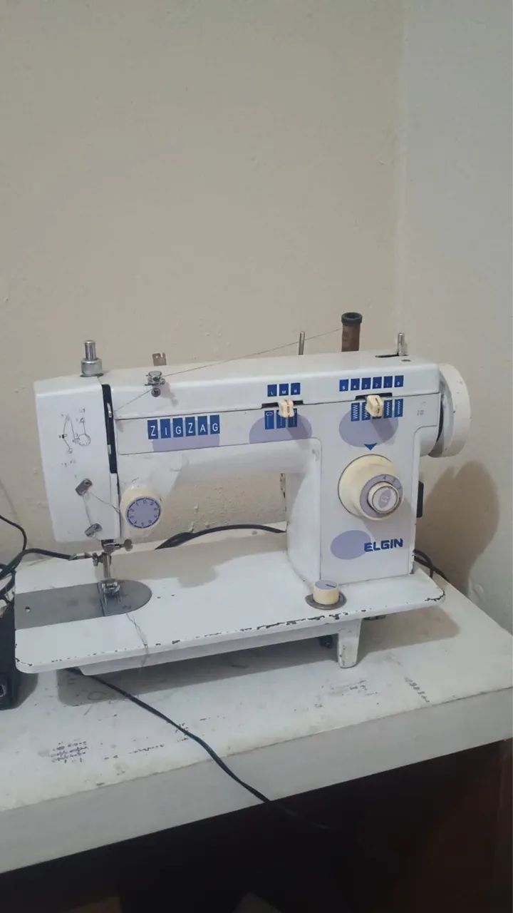 Máquina de costura singer 