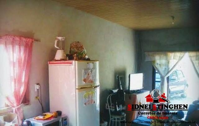 Casa na praia, local com rua pavimentada, imóvel próximo a água - Foto 3