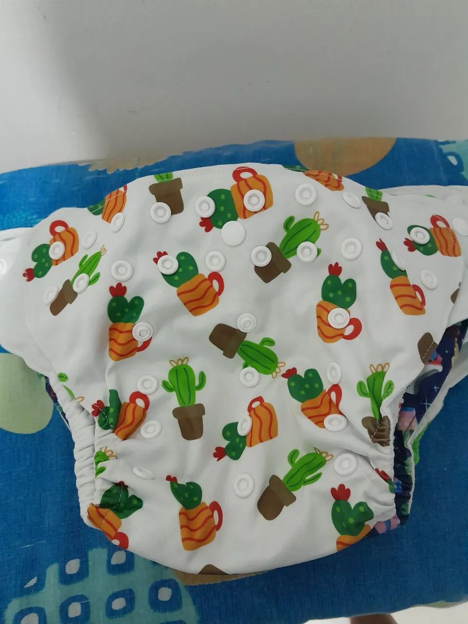 7 fralda reutilizável na foto só tem 6 mais ficou faltado 1 amarela  - Foto 3