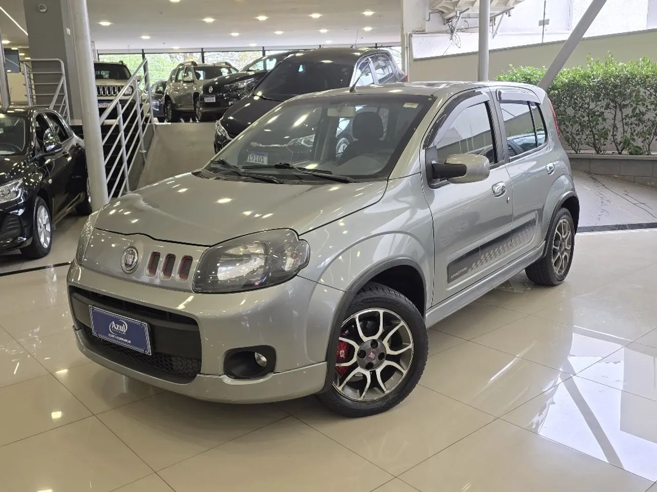 Fiat Uno Sporting 1.4 EVO Fire Flex 8V 4P 2013 - Foto 3