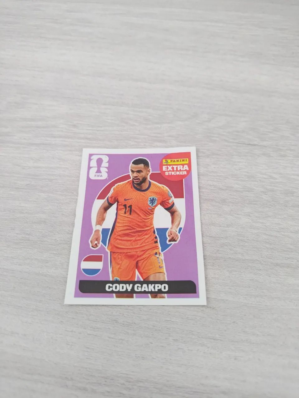 Figurinha Cody Gakpo Bordô 