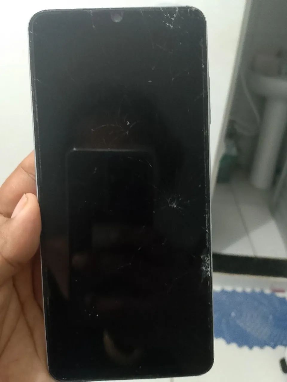 Celular smartphone samsung a06 com defeito