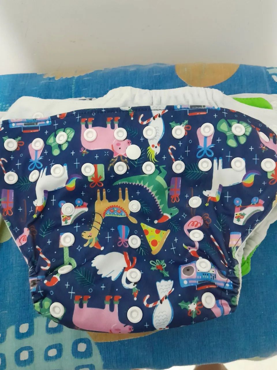 7 fralda reutilizável na foto só tem 6 mais ficou faltado 1 amarela  - Foto 4