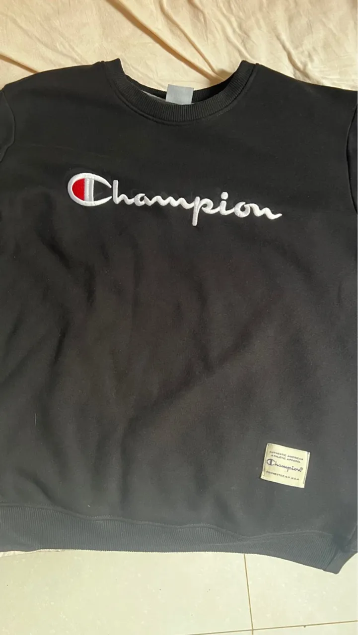 suéter champion