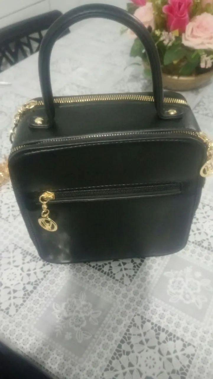 Vendo bolsa nova de mão  nunca usada  - Foto 2