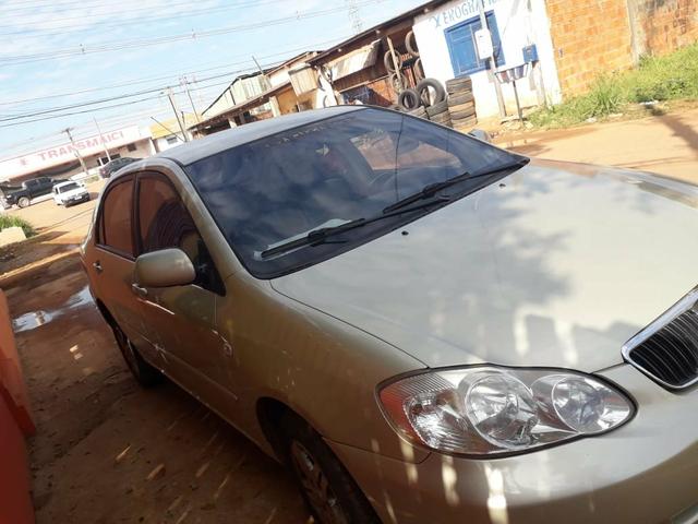 Vendo um corolla 15 mil ou troco por biz