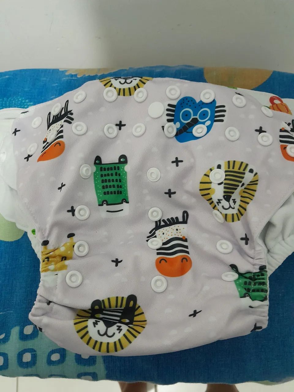 7 fralda reutilizável na foto só tem 6 mais ficou faltado 1 amarela  - Foto 2