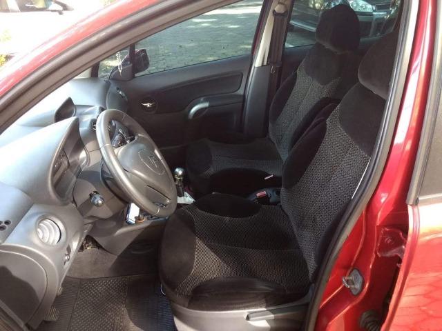 Citroen C3 2011 Exclusive 1.4 manual 8 v Flex - Foto 10