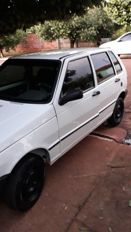 Uno 2003 com ar motor fire