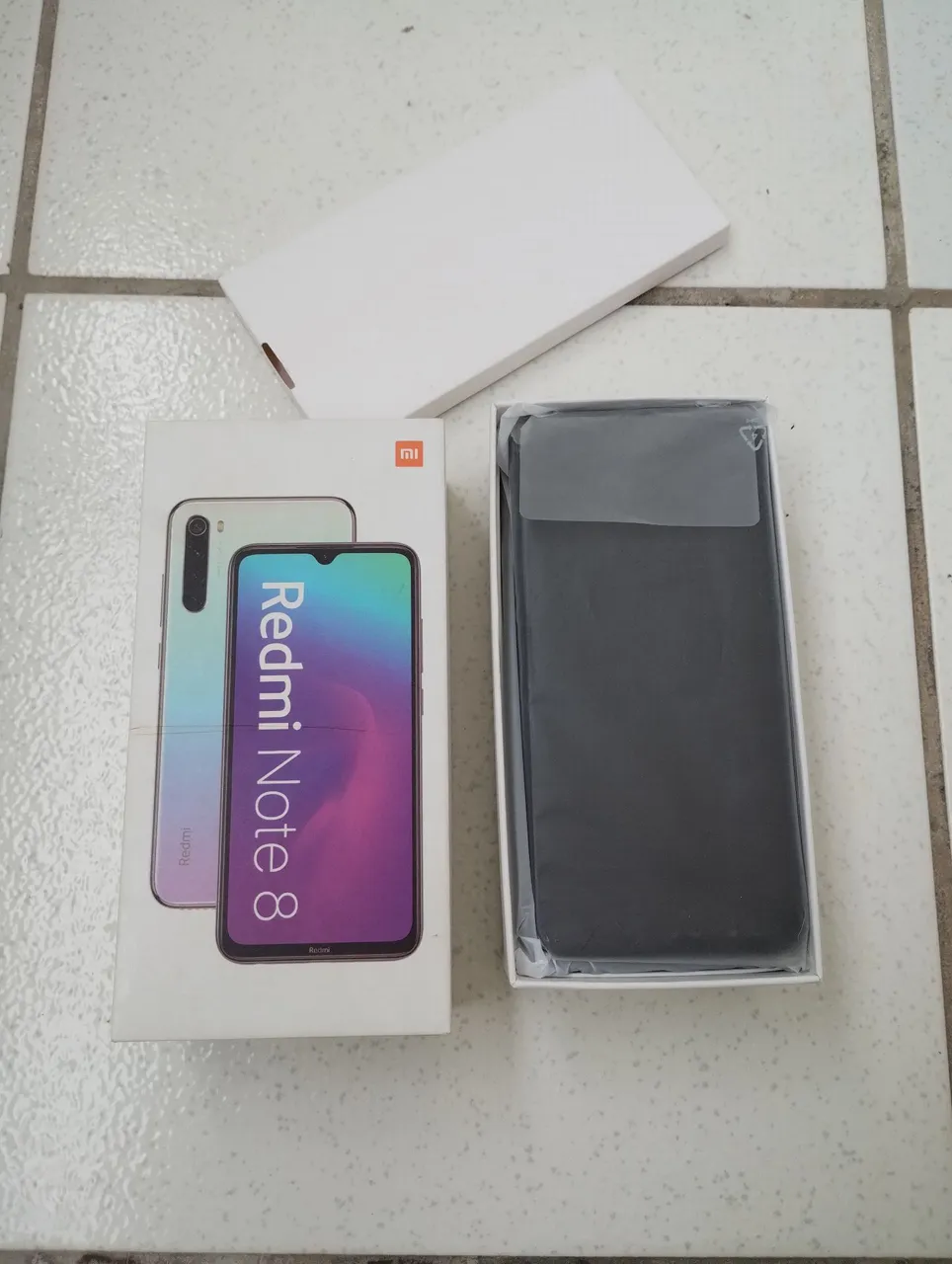 Redimi note 8 com defeito a tela apagou e não gera imagem 2 semana de uso só acende a luz
