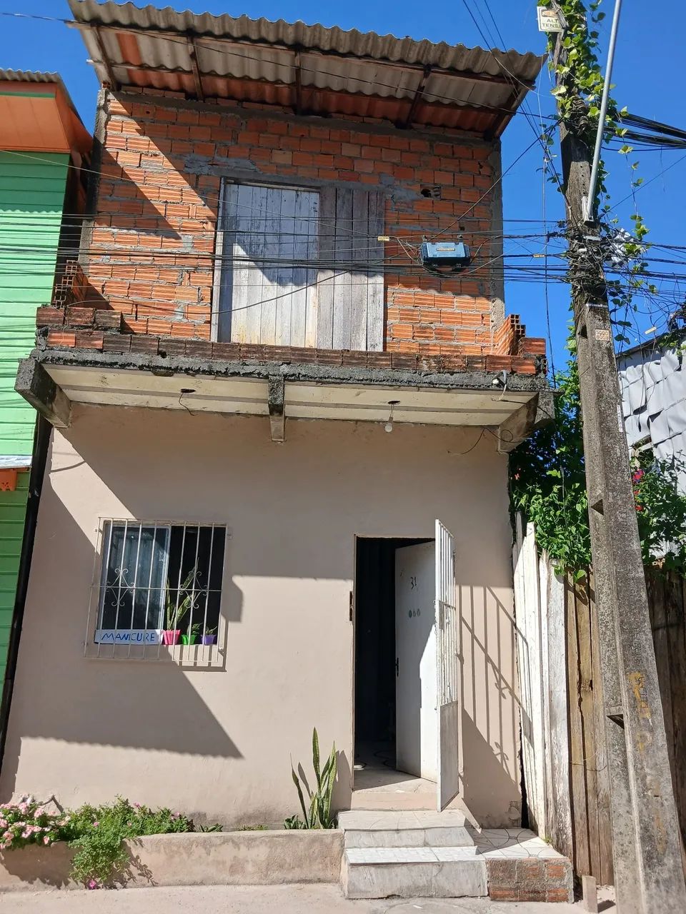 Casa de altos e baixo ao lado da mauriti