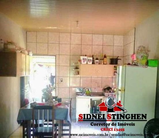 Casa na praia, local com rua pavimentada, imóvel próximo a água - Foto 5