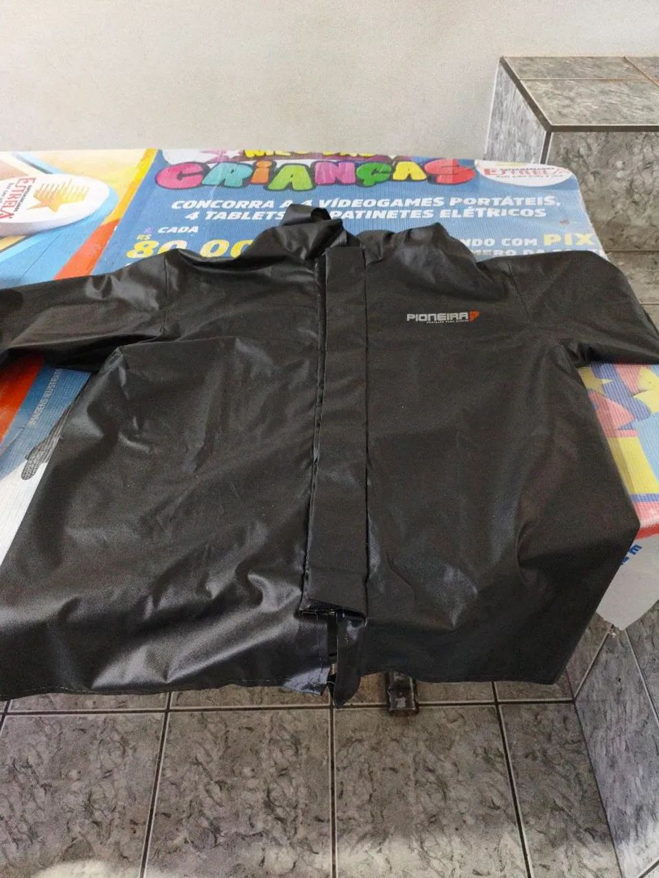 Capa de chuva PVC pioneira