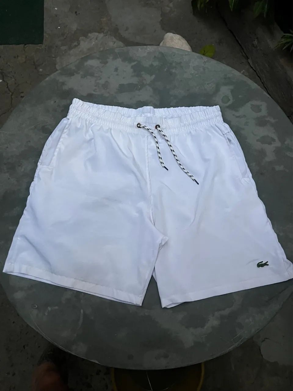 Bermuda Lacoste pra vender hoje