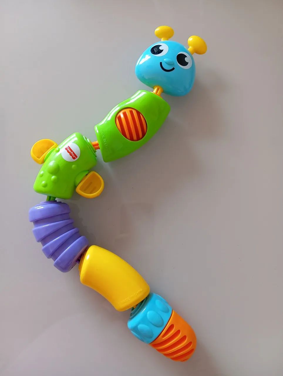 Centopéia encaixa e puxa Fisher-Price