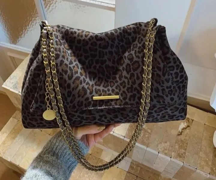 Bolsa animal print onça 